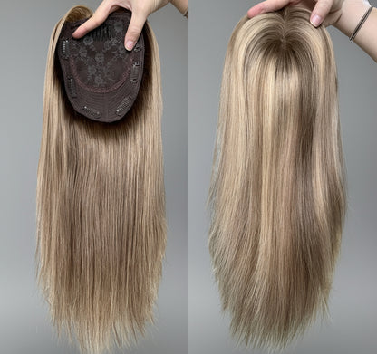 A two-part image showing a blonde human hair silk top topper. On the left, a close-up of the topper with a brown silk top, and on the right, a hand holding the topper with a clear silk top displaying the blonde hair beneath.